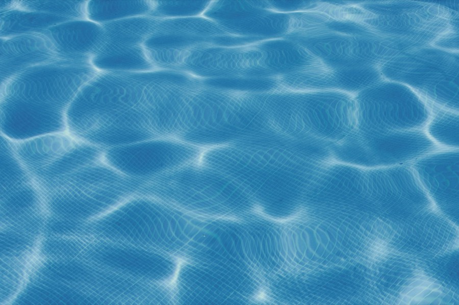 Close up of rippling aqua blue pool water